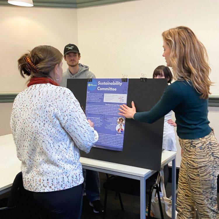 Students presenting their projects on campus sustainability.